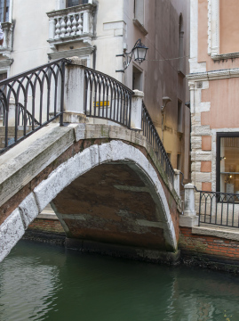 Historic bridge and old houses in Venice