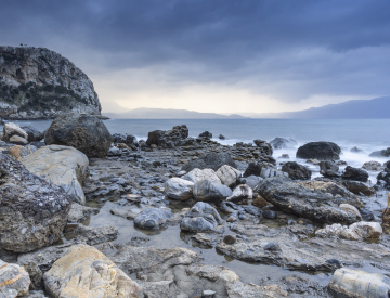 Rough Sea and Beach with Boulders