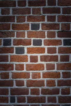Brick wall. Background with vignette