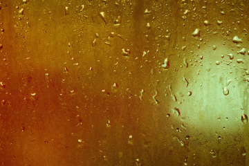 Water drops with orange tint