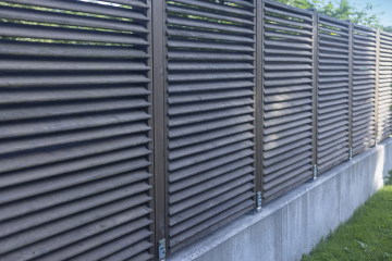 Panel fence, concrete foundation
