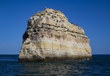Rock protruding from the sea