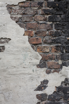 Brick Wall With Off-Cropped Plaster As Wallpaper