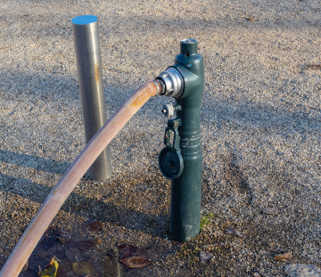 Street hydrant with connected hose