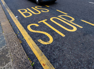 Bus stop, inscription on the asphalt