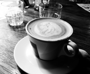 Coffee in a Cup on a Wooden Countertop