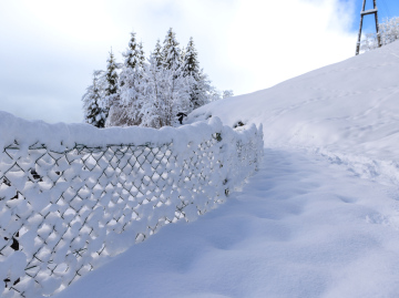 Heavy Snowfall and a buried fence.