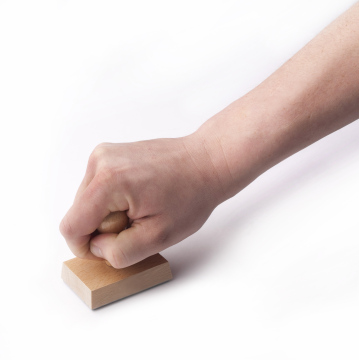 Hand With Wooden Seal