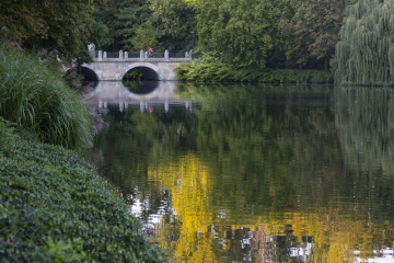Łazienki Królewskie in Warsaw, a bridge with a pond
