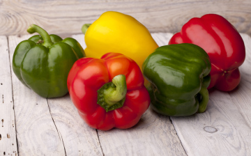 Colorful Peppers On Wood