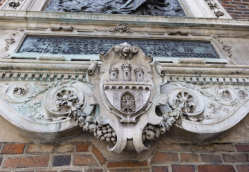 Architectural detail on the facade of St. Mary's Basilica, Krakow coat of arms