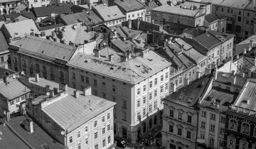 Roofs of historic tenement houses, black and white photo