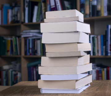 A stack of books in the library