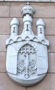The coat of arms of Krakow, a bas-relief on the facade of the building