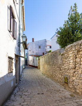 Narrow street in Krk on the Island of Krk. Croatia