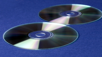 DVDs on a dark blue background