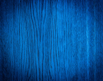 Blue background. The structure of the wood.