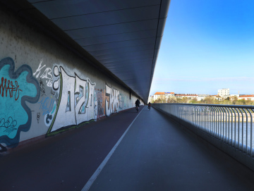 Bicycle and walking path under the Reichsbrücke in Vienna