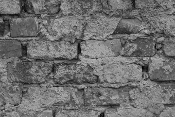 Bricks In Wall With Imposing Plaster