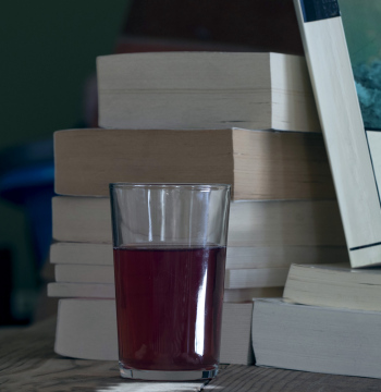 Books and a Glass of Fruit Juice