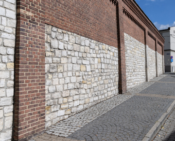 Historic limestone and brick wall