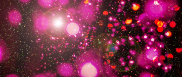 Background with sparkles and colored confetti fragments