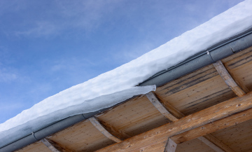 Snow on the Roof. Steel Gutter