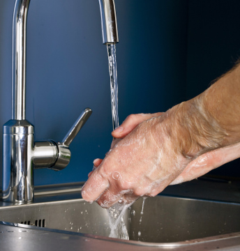 Washing Hands Under the Tap