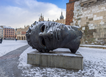 Krakow Market Square, head sculpture by Igor Mitoraj