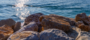 Sea shore reinforced with boulders