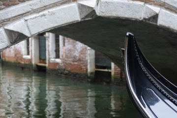 Venetian Gondola and Historic Bridge