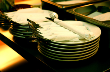 Plates And Cutlery Prepared By The Waiter