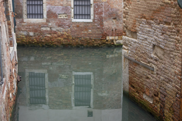 The old, narrow water canal in Venice
