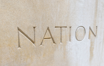Nation inscription in sandstone in English