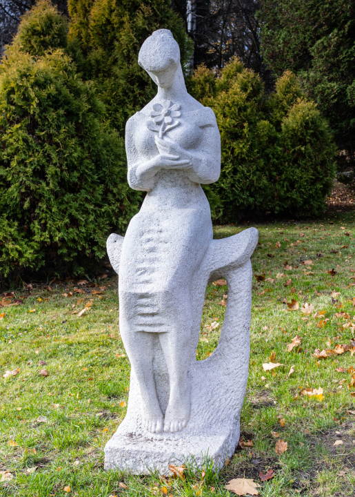 Woman with a Flower Sculpture in the Silesian Park