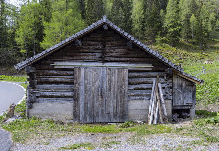 A wooden hut by the road