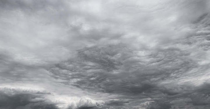 Dark clouds, vast skies