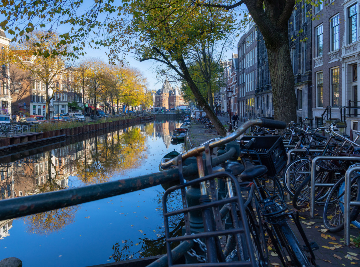 Parked Bicycles and Canal in Amsterdam
