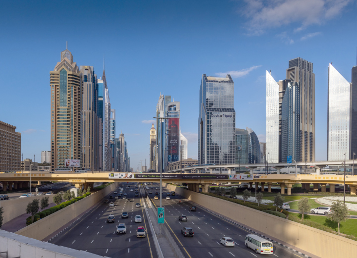 Busy streets and tall buildings in Dubai