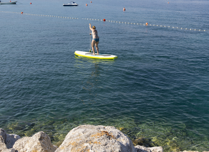 Swimming on the SUP board