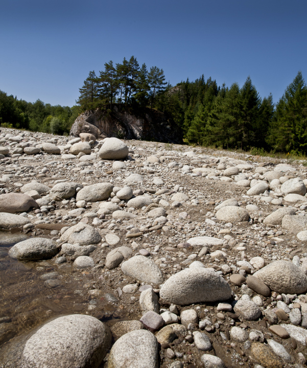 Boulders On The River Bank