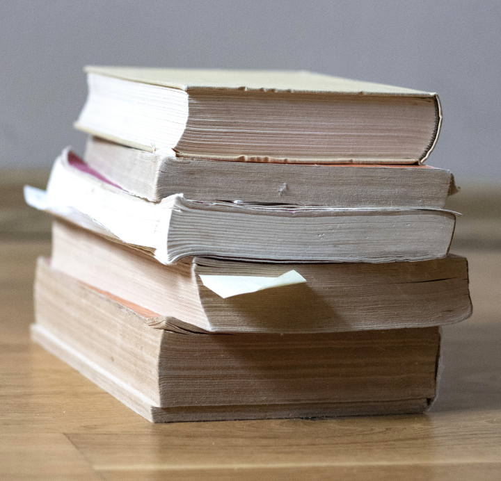 Old Books Arranged In A Stack