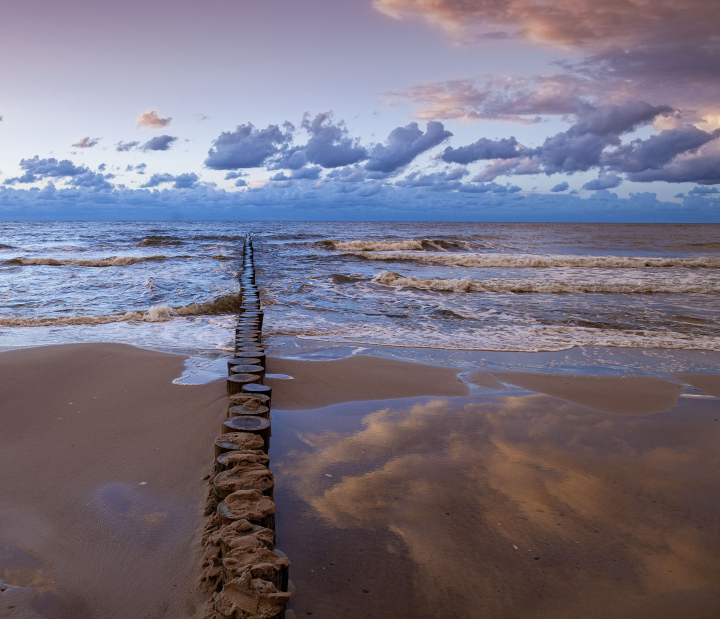 Sunset on the Beach with Breakwaters