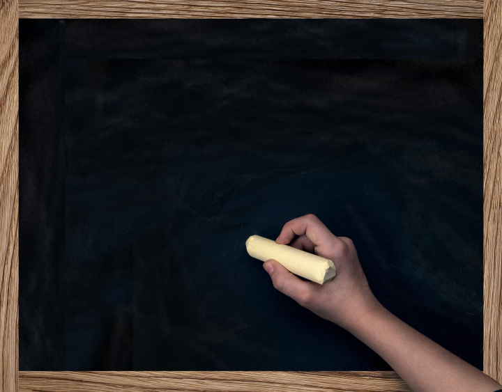 School blackboard, background, hand with chalk