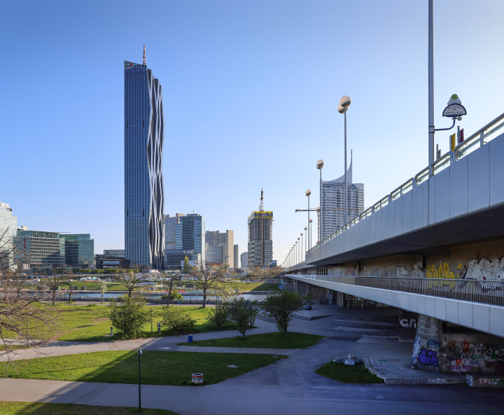 View of the DC Tower, the Danube and Vienna's modern buildings