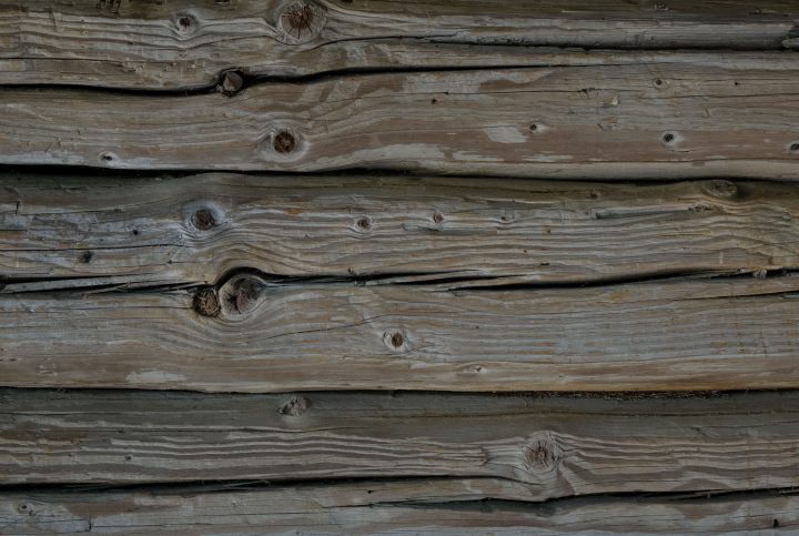 Wooden beams on the building wall