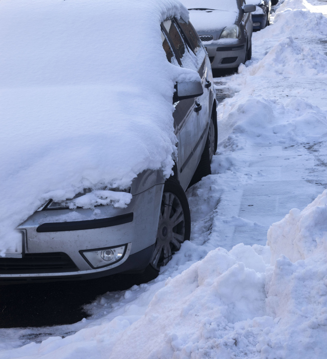 Snow on parked cars