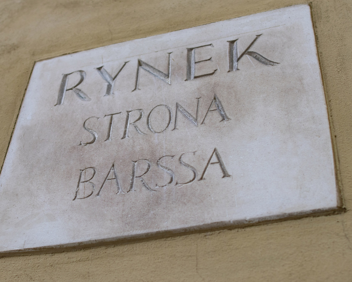 Market Square Side of Barssa stone plaque on the facade of a tenement house