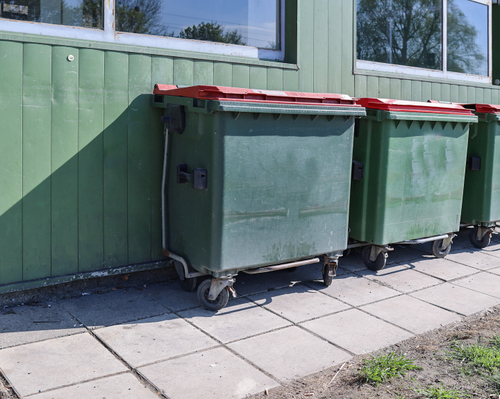 Waste bins in front of the building