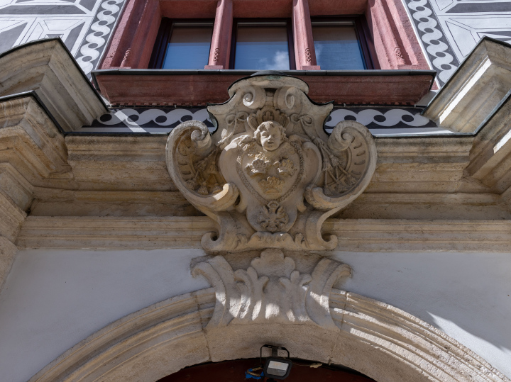 Architectural detail above the entrance to a historic tenement house